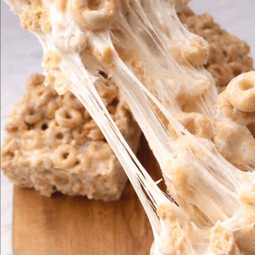 Homemade marshmallow cereal bar with a gooey pull
